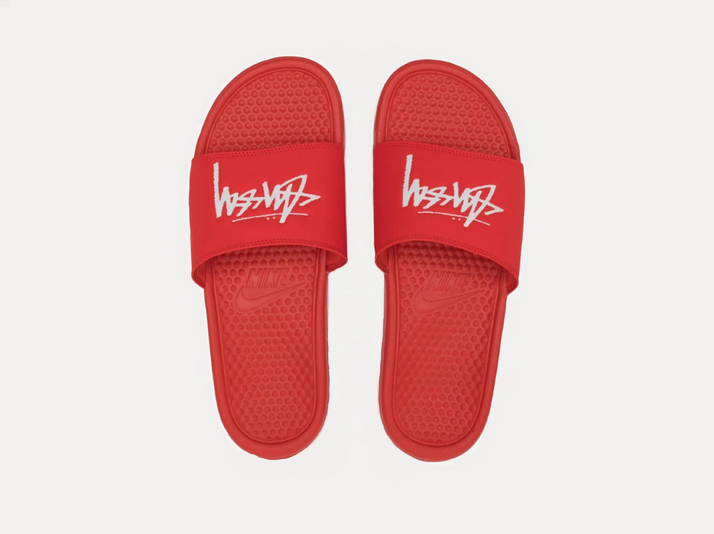 Red best sale nike sliders